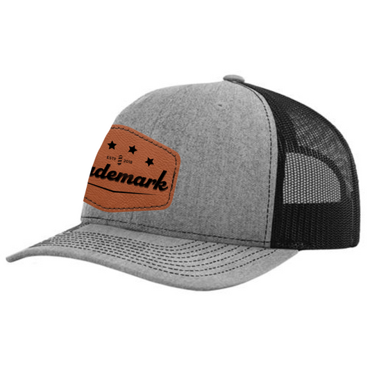 Trademark - Engraved Leatherette Patch Trucker Hat